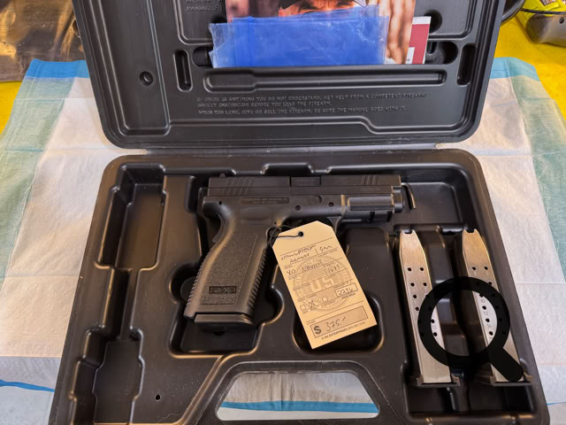Springfield Armory XDm in 9mm.  Used with case and spare magazines.